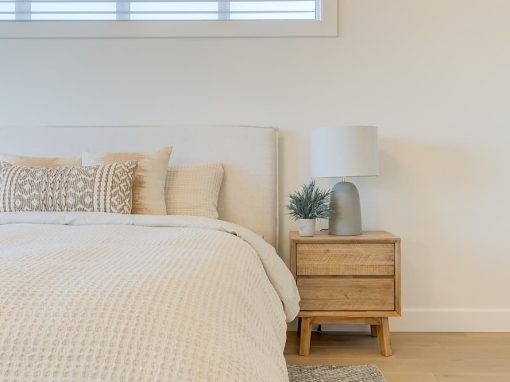 Bucktail bedroom with lamp and side table