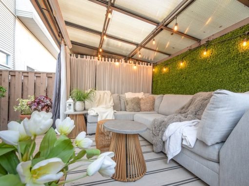 Burtch outdoor patio with curtains green wall